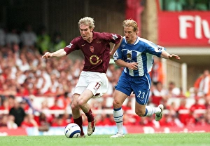 Images Dated 11th May 2006: Alex Hleb (Arsenal) Reto Ziegler (Wigan). Arsenal 4: 2 Wigan Athletic