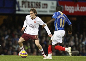 Portsmouth v Arsenal Gallery: Alex Hleb (Arsenal) Sulley Muntari (Portsmouth)