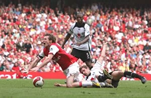 Hleb Alexander Collection: Alex Hleb is brought down for a penalty by Fulham defender Moritz Volz