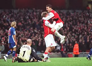 Alex Hleb celebrates scoring Arsenals 2nd goal with Cesc Fabregas and Brad Friedel