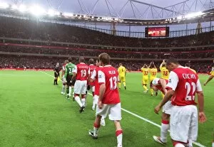 Images Dated 13th November 2006: Alex Hleb and Gael Clichy (Arsenal) walk out with the team onto the pitch