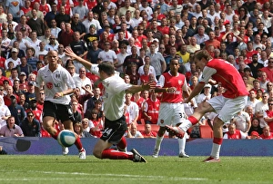 Images Dated 12th August 2007: Alex Hleb shoots past Fulham defender Chris Baird to score the 2nd Arsenal goal
