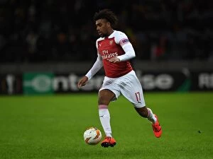 Images Dated 14th February 2019: Alex Iwobi in Action for Arsenal against BATE Borisov in UEFA Europa League Round of 32, 2019