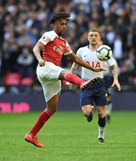 Tottenham Hotspur v Arsenal 2018-19 Collection: Alex Iwobi in Action: Premier League Showdown - Tottenham vs Arsenal (2018-19)