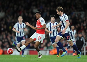 Images Dated 21st April 2016: Alex Iwobi (Arsenal) Craig Dawson (WBA). Arsenal 2: 0 West Bromwich Albion