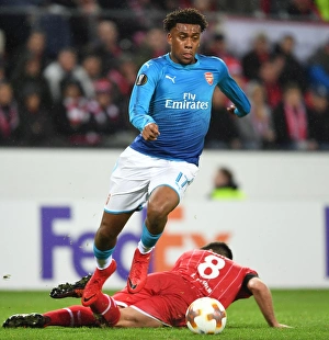 FC Koln V Arsenal 2017-18 Prints: Alex Iwobi Dashes Past Milos Jojic: Arsenal vs. 1. FC Koln - UEFA Europa League 2017-18