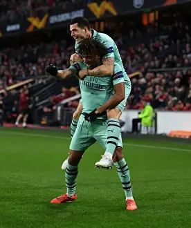 Stade Rennes V Arsenal 2018-19 Prints: Alex Iwobi and Granit Xhaka Celebrate Goal: Arsenal's Winning Moment against Stade Rennais in Europa League