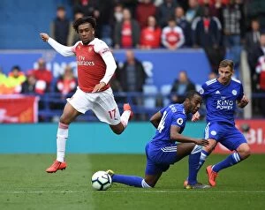 Leicester City v Arsenal 2018-19 Collection: Alex Iwobi Outwits Pereira: Thrilling Premier League Showdown Between Arsenal and Leicester
