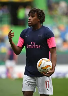 Alex Iwobi Prepares for Arsenal's Europa League Clash against Sporting CP