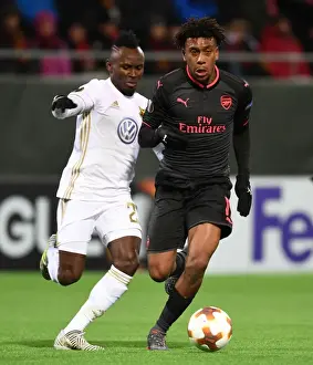 Ostersunds V Arsenal 2017-18 Prints: Alex Iwobi vs. Samuel Mensah: Clash in the Europa League between Ostersunds and Arsenal