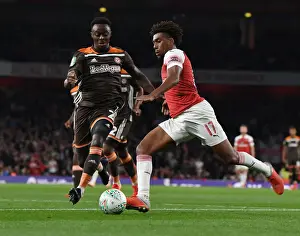 Arsenal V Brentford - Carabao Cup 2018-19 Prints: Alex Iwobi's Slick Moves: Outmaneuvering Moses Odubajo in Arsenal's Carabao Cup Victory