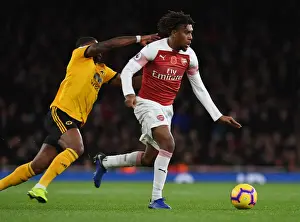 Arsenal V Wolverhampton Wanderers 2018-19 Prints: Alex Iwobi's Slick Moves: Outsmarting Ivan Cavaleiro at Emirates Stadium