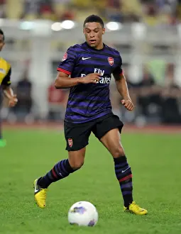Malaysia XI V Arsenal 2012-13 Prints: Alex Oxlade-Chamberlain: In Action for Arsenal Against Malaysia XI (2012-13)