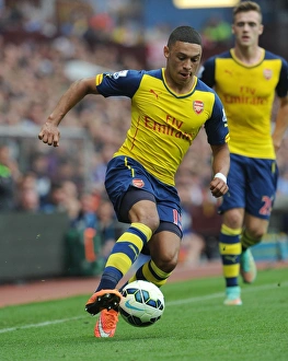 Alex Oxlade-Chamberlain in Action: Arsenal vs. Aston Villa, Premier League 2014-15