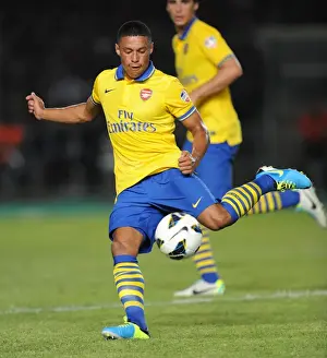 Indonesia Dream Team V Arsenal 2013-14 Prints: Alex Oxlade-Chamberlain in Action: Arsenal vs Indonesia All-Stars (2013)