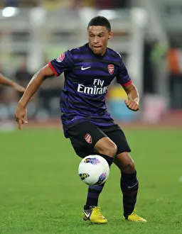 Malaysia XI V Arsenal 2012-13 Prints: Alex Oxlade-Chamberlain in Action for Arsenal vs Malaysia XI (2012-13)