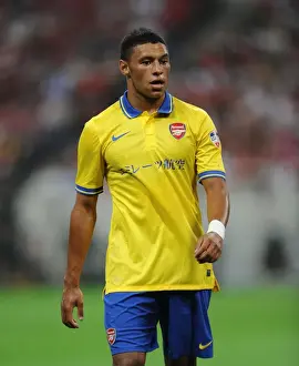Uwara Red Diamonds V Arsenal 2013-14 Prints: Alex Oxlade-Chamberlain in Action: Arsenal vs Urawa Red Diamonds, 2013 Pre-Season Friendly
