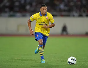Vietnam V Arsenal 2013-14 Prints: Alex Oxlade-Chamberlain: In Action for Arsenal vs Vietnam, 2013