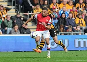 Images Dated 20th April 2014: Alex Oxlade-Chamberlain in Action: Hull City vs Arsenal, Premier League 2013/14