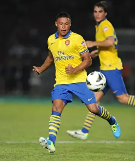 Indonesia Dream Team V Arsenal 2013-14 Prints: Alex Oxlade-Chamberlain: In Action Against Indonesia All-Stars (2013)