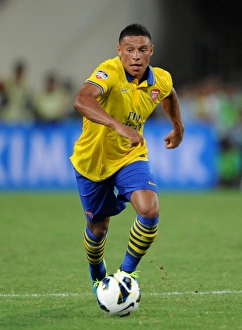 Vietnam V Arsenal 2013-14 Prints: Alex Oxlade-Chamberlain in Action: Vietnam vs. Arsenal (2013)