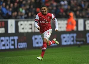 Images Dated 22nd December 2012: Alex Oxlade-Chamberlain in Action: Wigan Athletic vs Arsenal, Premier League 2012-13
