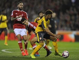 Nottingham Forest v Arsenal EPL Cup 3rd Round 2016-17 Collection: Alex Oxlade-Chamberlain (Arsenal) Eric Lichaj (Forest). Nottingham Forest 0: 4 Arsenal