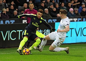 Images Dated 14th January 2017: Alex Oxlade-Chamberlain (Arsenal) Alfie Mawson (Swansea). Swansea City 0: 4 Arsenal