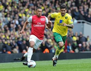 Arsenal v Norwich City 2011-12 Gallery: Alex Oxlade-Chamberlain (Arsenal) Bradley Johnson (Norwich). Arsenal 3: 3 Norwich City