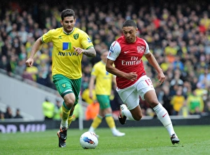 Arsenal v Norwich City 2011-12 Gallery: Alex Oxlade-Chamberlain (Arsenal) Bradley Johnson (Norwich). Arsenal 3: 3 Norwich City