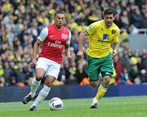 Arsenal v Norwich City 2011-12 Gallery: Alex Oxlade-Chamberlain (Arsenal) Bradley Johnson (Norwich). Arsenal 3: 3 Norwich City