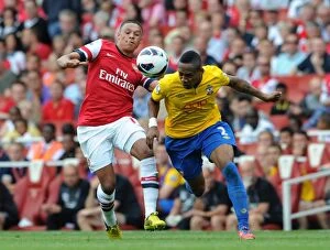 Images Dated 15th September 2012: Alex Oxlade-Chamberlain (Arsenal) Nathaniel Clyne (Soton). Arsenal 6: 1 Southampton