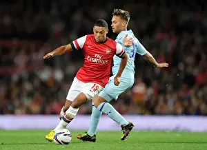 Arsenal V Coventry City - Capital One Cup 2012-13 Prints: Alex Oxlade-Chamberlain (Arsenal) James Bailey (Coventry). Arsenal 6: 1 Coventry City