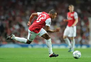 Arsenal V Olympiacos 2011-12 Prints: Alex Oxlade-Chamberlain: Arsenal Star in UEFA Champions League Action against Olympiacos (2011-12)