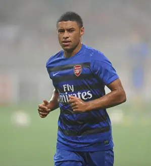 Uwara Red Diamonds V Arsenal 2013-14 Prints: Alex Oxlade-Chamberlain: Arsenal's Readiness in Urawa Red Diamonds 2013-14 Pre-Season Match