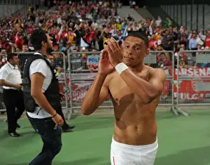 Besiktas V Arsenal 2014-15 Prints: Alex Oxlade-Chamberlain Celebrates with Arsenal Fans after First Leg of Besiktas vs Arsenal UEFA Champions League