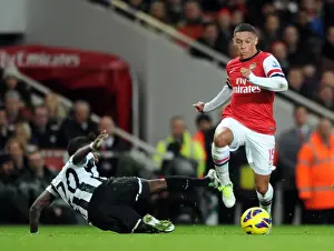 Arsenal V Newcastle United 2012-13 Prints: Alex Oxlade-Chamberlain Outmaneuvers Gael Bigirimana in Arsenal's Victory over Newcastle United