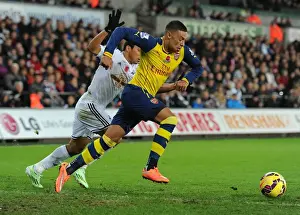 Alex Oxlade-Chamberlain Outmaneuvers Jefferson Montero in Swansea v Arsenal Premier League Clash