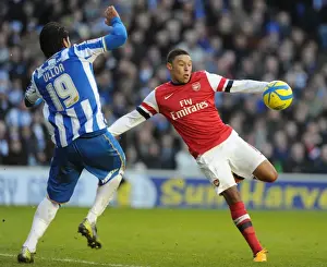 Brighton And Hove Albion V Arsenal FA Cup 2012-13 Prints: Alex Oxlade-Chamberlain Scores Past Leonardo Ulloa: Brighton & Hove Albion vs Arsenal