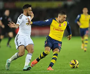 Alex Oxlade-Chamberlain Stands Firm Against Neil Taylor's Challenge (Swansea vs Arsenal, 2014-15)