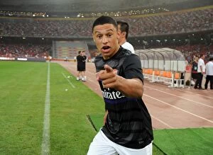 Images Dated 27th July 2012: Alex Oxlade-Chamberlain Suffers Defeat with Arsenal against Manchester City in Beijing Pre-Season