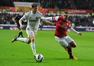 Swansea Prints: Alex Oxlade-Chamberlain Surges Past Ben Davies in Swansea vs Arsenal Premier League Clash