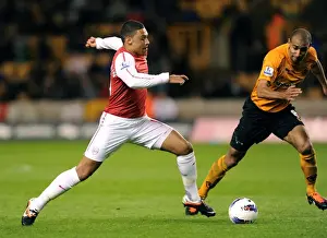Wolverhampton Wanderers V Arsenal 2011-12 Prints: Alex Oxlade-Chamberlain Surges Past Carl Henry: Wolverhampton Wanderers vs