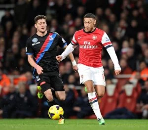 Crystal Palace Collection: Alex Oxlade-Chamberlain Surges Past Joel Ward in Arsenal's Battle Against Crystal Palace