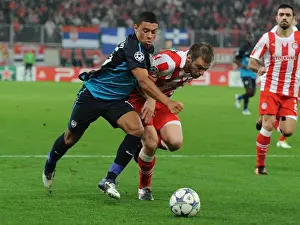 Alex Oxlade-Chamberlain vs. Avraam Papadopoulos: A Battle in the UEFA Champions League between Olympiacos and Arsenal