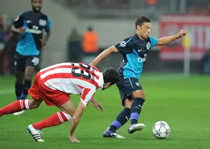 Olympiacos V Arsenal 2011-12 Prints: Alex Oxlade-Chamberlain vs Ivn Marcano: Battle in the UEFA Champions League between Olympiacos and Arsenal