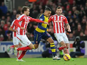 Alex Oxlade-Chamberlain vs Marc Muniesa: Intense Battle at Britannia Stadium