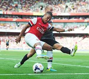 Arsenal V Galatasaray 2013-14 Prints: Alex Oxlade-Chamberlain vs. Semih Kaya: Galatasaray's Upset Over Arsenal (4-8-13)