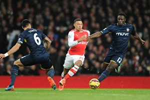 Alex Oxlade-Chamberlain's Slick Moves: Outsmarting Fonte and Wanyama in Arsenal's Victory over Southampton (2014-15)