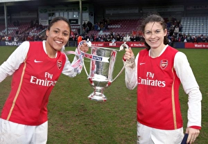 Alex Scott and Karen Carney (Arsenal) with the League Cup Trophy